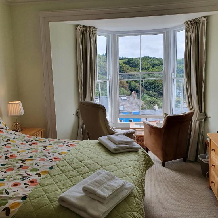 Deluxe Triple Room with Sea View | Pendyffryn Guesthouse and B&B gallery image 2