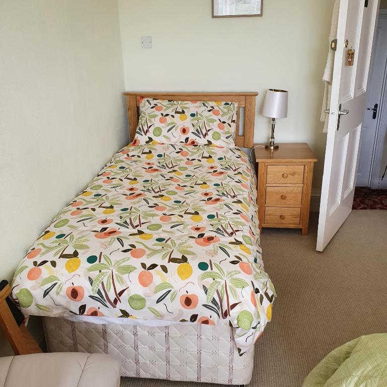 Deluxe Triple Room with Sea View | Pendyffryn Guesthouse and B&B gallery image 4